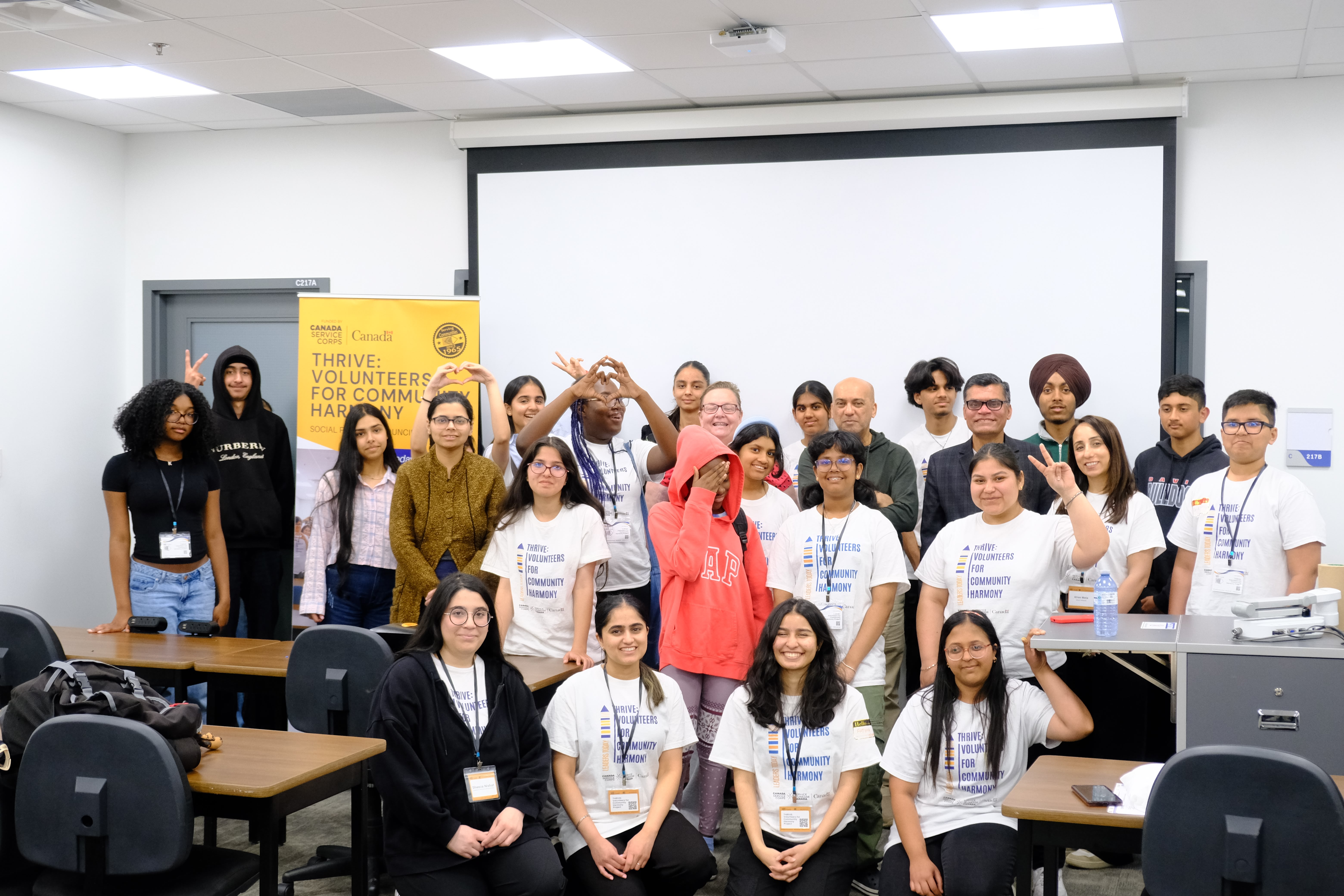 A group picture of the Facilitator, SPCP CEO, SPCP Employees, and participating youth during the Learning How to Practice Community Workshop with Dr. Bethany Osborne on June 3, 2025