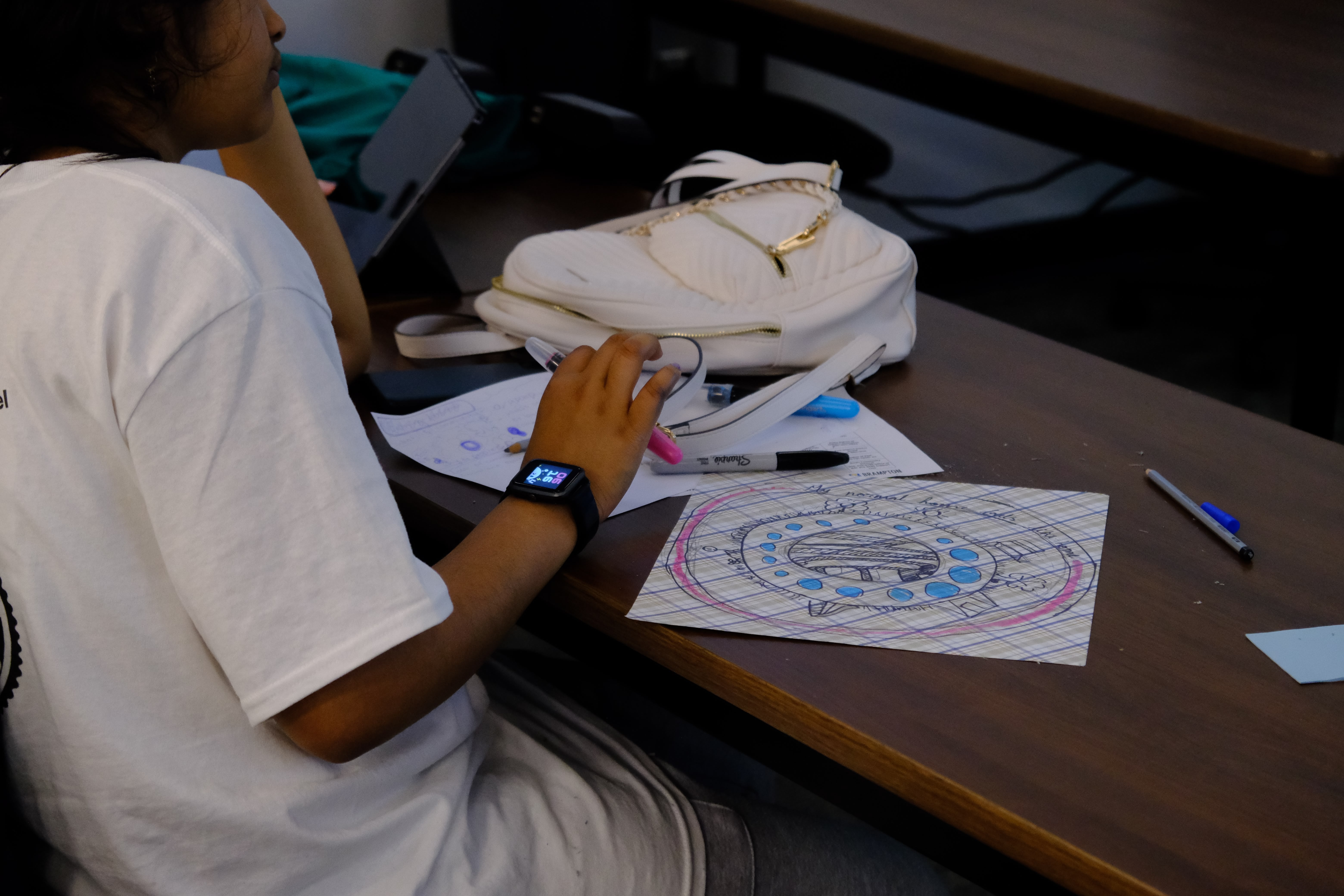 A closeup picture of a finished drawing of circles on a paper by a youth as part of the Learning How to Practice Community Workshop with Dr. Bethany Osborne on June 3, 2025