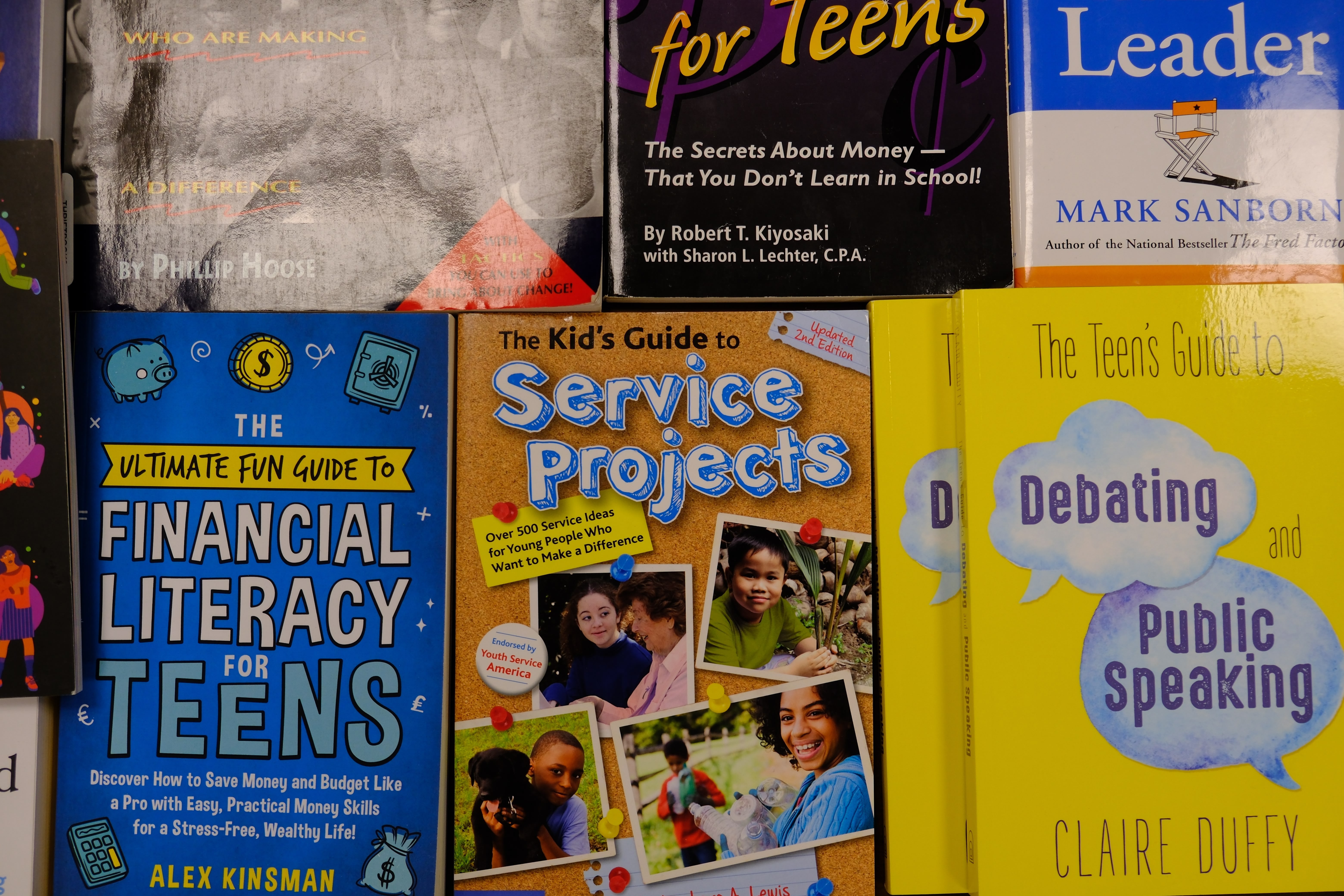 A closeup picture of various books about Mental and Physical Wellness for youths showcased during the Mental & Physical Wellness Workshop with Nicole Johnson on May 27, 2025