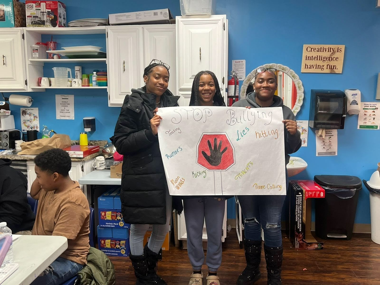 A picture of youths at a life skill, mental wellness and safer community workshop.