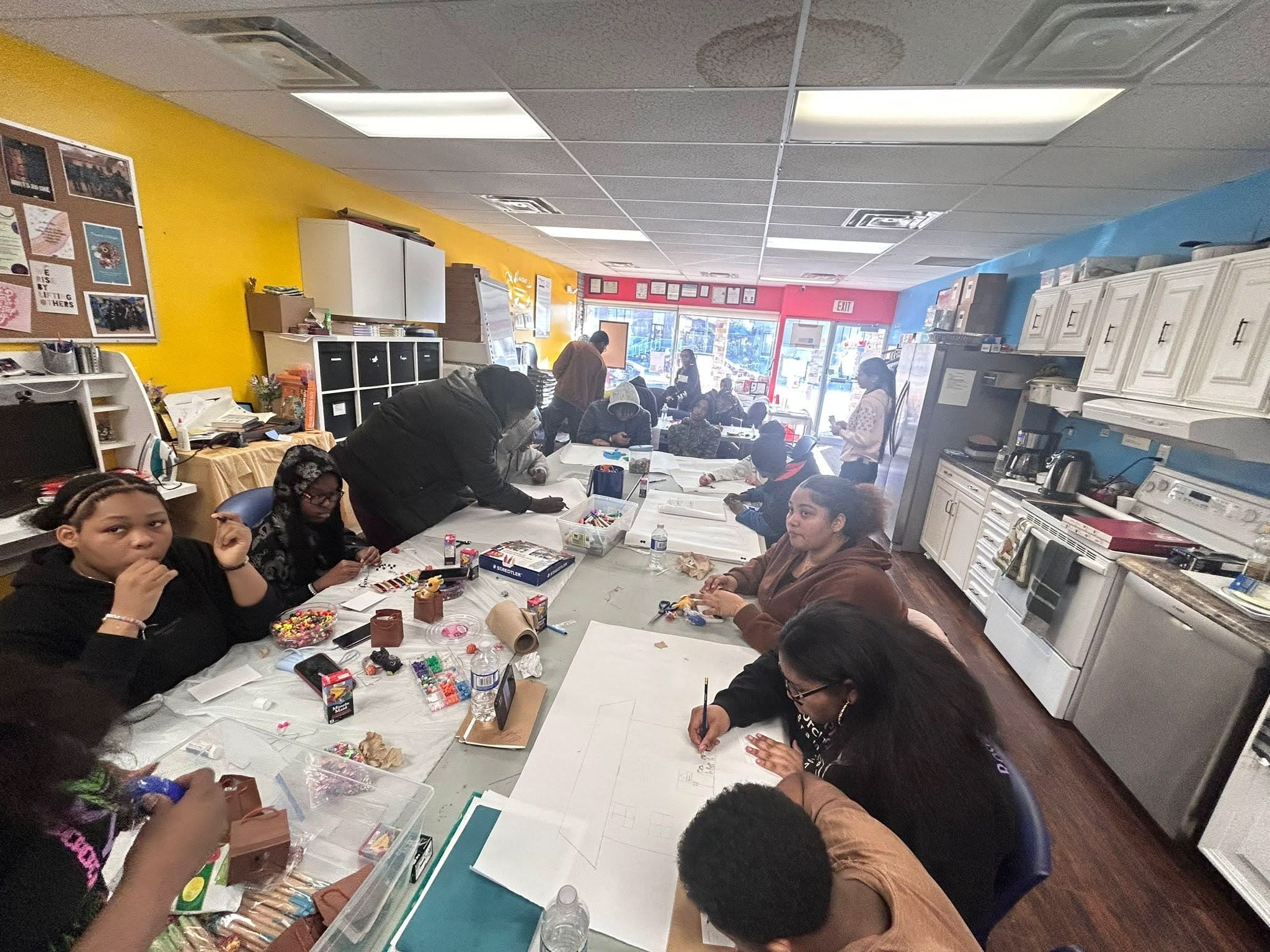 A picture of youths at a life skill, mental wellness and safer community workshop.