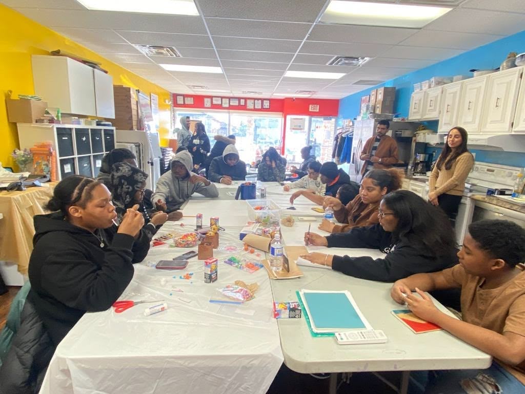 A picture of youths, SPCP staff and placement students at a life skill, mental wellness and safer community workshop.