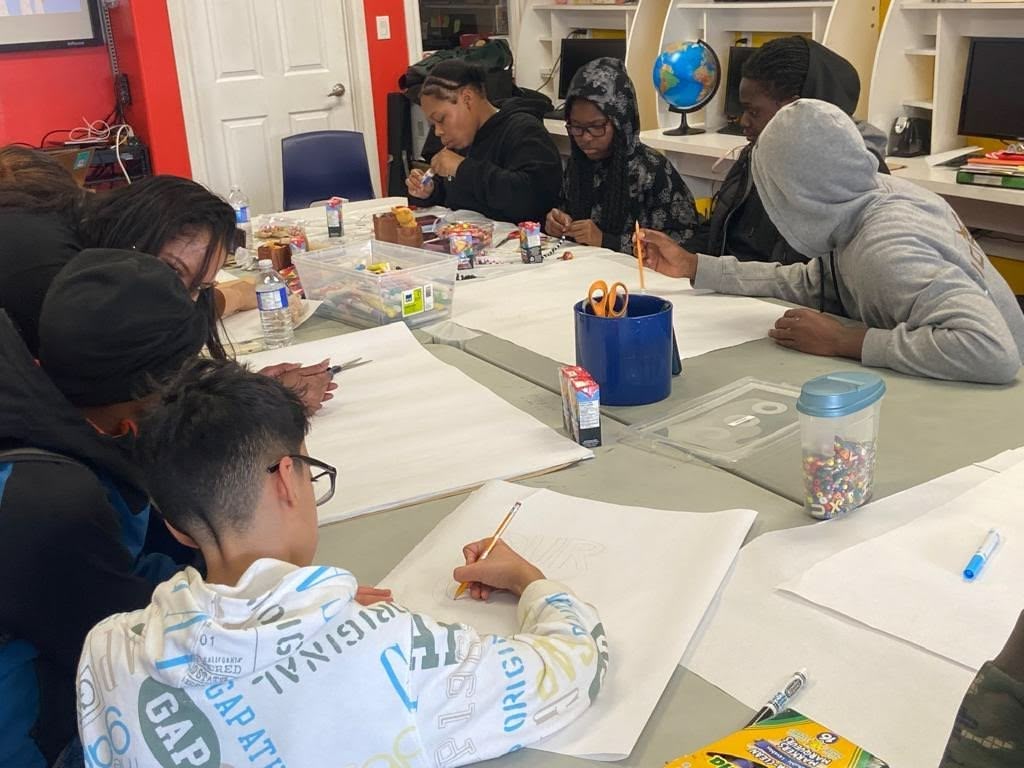 A picture of youths at a life skill, mental wellness and safer community workshop.