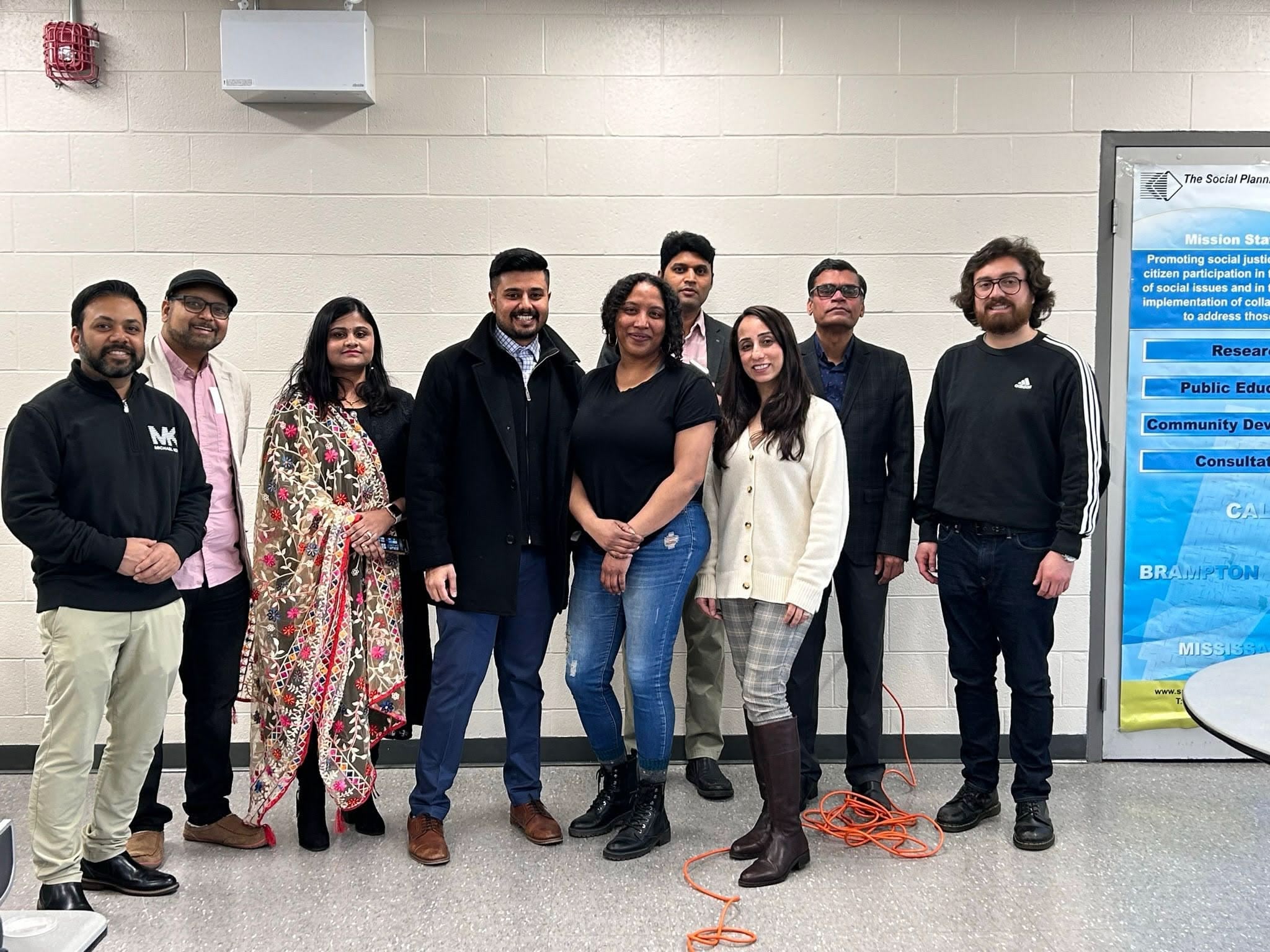 A picture of a facilitator, SPCP staff, CEO, placement students and other people at a life skill, mental wellness and safer community workshop for youths.
